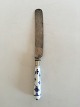 Royal 
Copenhagen Blue 
Fluted Plain 
Dinner Knife. 
The Blade has 
some wear to it 
but the 
porcelain ...