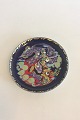 Bjørn Wiinblad 
Rosenthal 
Sindbad Plate / 
Der Sufahrer No 
2.
Measures 
16,3cm / 6 
1/3".