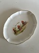 Oval Cake Tray 
with Gnome 
playing on 
Flute while two 
Gnome Couples 
are Dancing. 35 
x 27.5 cm (13 
...