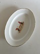 Large Oval 
Serving Dish 
with Two Gnomes 
Carrying a Dish 
with a Cooked 
Christmas 
Turkey. The 
gold ...