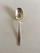 Hansen Hansen 
Charlotte 
Sterling Silver 
Dessert Spoon. 
Measures 17.5 
cm / 6 57/64 
in.
