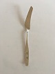 Hans Hansen 
Charlotte 
Sterling Silver 
Fish Knife. 
20.4 cm L (8 
1/32")