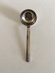 Hans Hansen 
Arvesølv No 18 
Sterling Silver 
Sauce Ladle. 
17.5 cm L (6 
57/64")