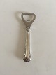 Cohr Herregård 
Bottle Opener 
with Silver 
Handle. 13.2 cm 
L (5 13/64").