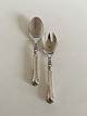 Cohr Herregaard 
Silver and 
Stainless Steel 
Salad Set. 18 
cm L (7 3/32"). 
The handles are 
made of ...