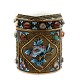 Chinese jar of gilted sterling silver, set with jade, enamel and semi-precious 
stones