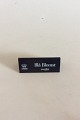 Royal 
Copenhagen 
Dealer 
Advertising 
sign in Plastic 
"Blue Flower 
Curved".
Measures 
10,5cm x 4,2cm