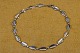 Collier 
necklace 
silver, 
articulated in 
concave parts 
and assembled 
by convex 
parts. The ...