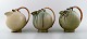 Arne Bang: 3 ceramic jugs with wicker handle. Model number. 151.
