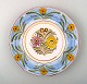 Tulle Emborg for Kähler, Denmark, glazed Stoneware dish/plate decorated with 
flowers.