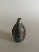 Small Stoneware 
Vase. 
(unknown). 10 
cm H (3 
15/16"). In 
good condition.