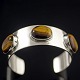 Arne Johansen  
Sterling Silver 
Bangle with 
Tiger's Eye.
Designed by 
Arne Johansen 
...