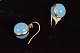 Earrings with 
hanger and 
socket in gold 
plated silver 
and pale blue 
and clear 
stones. Stamped 
...