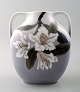 Royal Copenhagen Art Nouveau vase with handles, decorated with flowers.