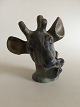Deer Head in 
Stoneware by 
Arne Ingdam. 
21.5 cm H (8 
15/32"). 20 cm 
W (7 7/8")