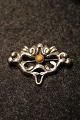 Old Art Nouveau 
brooch in 
silver with 
small stone. 
Measures: 
6x4cm.