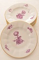 Royal 
Copenhagen 
porcelain. 
Purpur flower 
angular with 
gold. Royal 
Copenhagen, 
Cake plate no. 
...