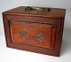 Chinese mahjong 
games, 19th 
century. In box 
of precious 
wood with 
fittings and 
handles in 
brass. ...