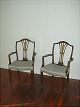 Two armchairs 
Hepplewhite 
style