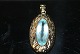 Pendants Light 
blue stones 14 
Karat Gold
Stamp: 585, HF
Goldsmith: 
1893-1937 H. 
...