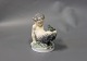 Royal porcelain 
figurine Pan 
with Frog, no.: 
1713.
Dimensions: H: 
12.5 cm and 
Dia: 8 cm.
