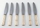 Bernadotte 6 dinner knives from Georg Jensen.
