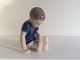 Bing and 
Grondahl, 
Sitting boy # 
1671, 10cm 
tall, 1st 
grade, Design 
Ingeborg 
Plockross 
Irminger ...