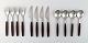 Complete service for 4 p., Henning Koppel. Strata cutlery stainless steel and 
brown plastic. Produced by Georg Jensen.
