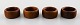 Kay Bojesen 4 napkin rings in teak.
