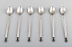 Very early Georg Jensen silver "Acorn" cocktail spoons / café latte / ice tea 
spoons.
6 pieces.
Designer: Johan Rohde.
