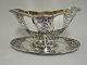 Rosenborg. 
Sterling (925). 
Sauce bowl .. 
Michelsen. 
Length 22 cm. 
Produced 1915.