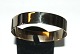 Fixed Bracelet, 
14 Carat Gold
Stamp: 585
Interior 
dimensions: 6.5 
cm.
Width 14 ...