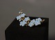 Simpel flower 
brooch in blue 
enamel and in 
gilded 925 
sterling 
silver.
W - 4 cm and L 
- 1,5 cm.