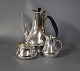 Coffee serving  
set consisting 
of Coffee jug 
with Black 
Ebony handle, 
cream jug and 
sugar bowl, ...