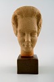 Rare Johannes Hedegaard for Royal Copenhagen.
Bust in ceramics with glazed foot, no. 22038 in the form of Her Royal Highness 
Queen Margrethe II as Princess Margrethe 1963.