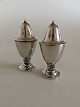 Georg Jensen 
Sterling Silver 
Salt & Pepper 
Set No 866. 7 
cm H (2 3/4"). 
One weighs 35 
grams ...