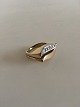 Georg Jensen 
18K Partly 
Rhodinated Gold 
Ring with ten 
Brilliant 
Diamonds. Ring 
Size 49 / US 5. 
...