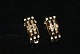 Earrings gold 
walls Stone 5 
rows, 14 carat
Stamp: 585, BH
Goldsmith: 
1936-2007 
Flemming ...