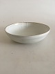 Royal 
Copenhagen 
White Juliane 
Marie with Gold 
Bowl No 12050. 
5.5 cm H. 21 cm 
Ø. In whole but 
...