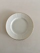 Royal 
Copenhagen 
Juliane Marie 
White Cake 
Plate with Gold 
No 12014.18 cm 
dia (7 3/32"). 
In nice ...