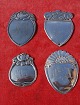 Coat shields in 
Danish solid 
silver 830S in 
a good used 
condition.
Top:
* Flower with 
"J.J." ...