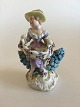 Limbach 
Figurine of 
Country Girl in 
Rococo Style. 
11.5 cm tall (4 
17/32"). Has a 
chip on the ...