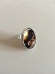 Svend Haugaard 
Sterling Ring 
with Pretty 
Mixed Brownish 
Stone Measures 
3 cm / 1 3/16 
in. Ring ...