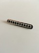 Hans Hansen 
Sterling Silver 
Brooch. 
Measures 6.3 cm 
/ 2 31/64 in. 
Weighs 9 g / 
0.40 oz.