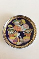 Bjørn Wiinblad 
Rosenthal 
Aladdin Plate / 
Wunderlampe No 
6.
Measures 
16,2cm / 6 1/3"