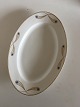 Royal 
Copenhagen No 
118 Oval 
Serving Platter 
w. Golden 
Peacock Feather 
Ornament. 45 cm 
(17 ...