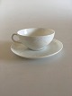 Royal 
Copenhagen 
White Ba Coffee 
Cup and Saucer. 
Measures 8 cm 
dia. 4 cm H. In 
nice whole ...