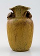 Arne Bang. Ceramic Vase with foliage.
