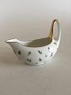 Royal 
Copenhagen Art 
Nouveau Butter 
Sauce Pitcher. 
With Rose Buds 
and Gold. The 
gold has some 
...