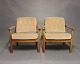 A pair of easy chairs in polished wood and seats in velvet of Danish Design from 
the 1960s.
5000m2 showroom.